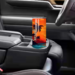 This photo displays the beach sunset tumbler in vehicle cup holder, perfect for errands or travel
